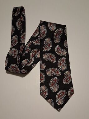 Don Loper100% Silk Black Paisley Men's Tie with Red and Cream Accents.